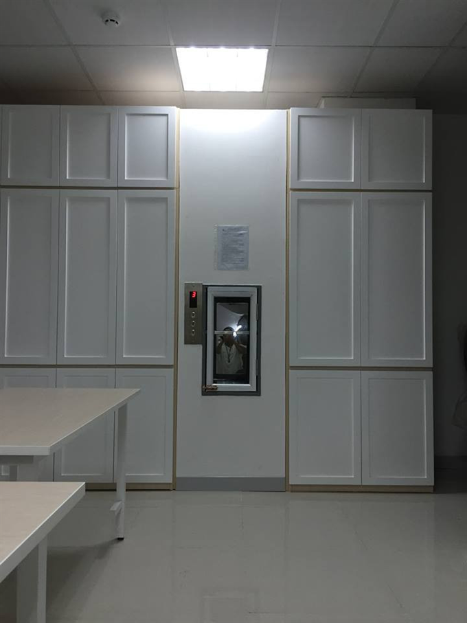 thang máy tải tiền